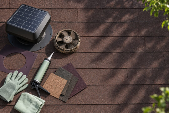 Solar Attic Fan Installation Components with Ventilation Hardware and Rooftop Mounting Tools