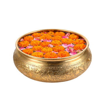 Traditional Golden Brass Urli Bowl with Floating Marigold Blossoms and Rose Petals