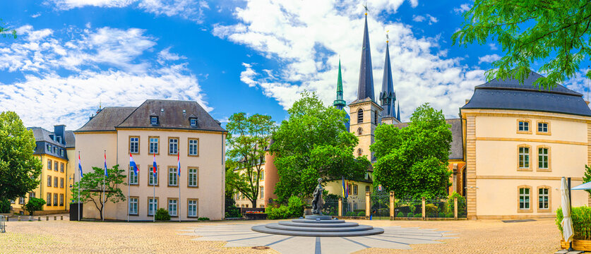 Luxembourg panoramic view of Place de Clairefontaine square with Notre-Dame Cathedral of Our Lady church, Ministry of State building, Charlotte statue in Luxembourg City historical centre Ville Haute