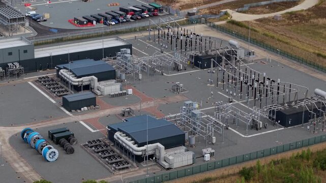 Aerial view of modern electrical substation and transformer facility in Bramford, UK