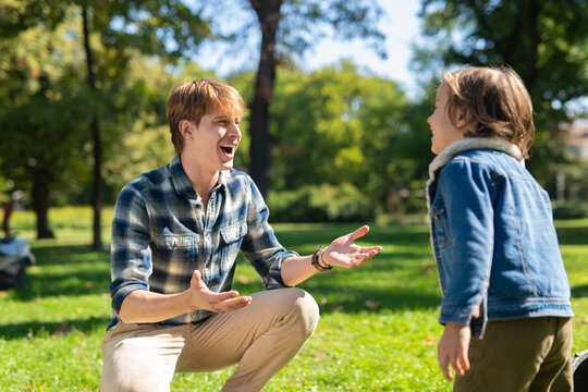 Father and child bonding enjoying playtime in park
