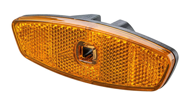 Close-up of bicycle amber reflector with geometric pattern