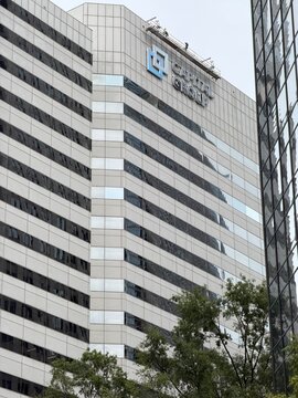 Capital Group East Coast hub in Charlotte, NC installs signage on One Independence Center in uptown Charlotte, NC