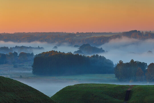 Fields covered in fog in Kernave, Lithuania