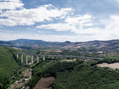 Aerial View of a Highway Bridge Spanning a Deep Valley