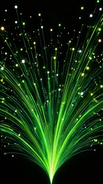 Green fiber optic cables radiate upward in darkness with bright glowing points