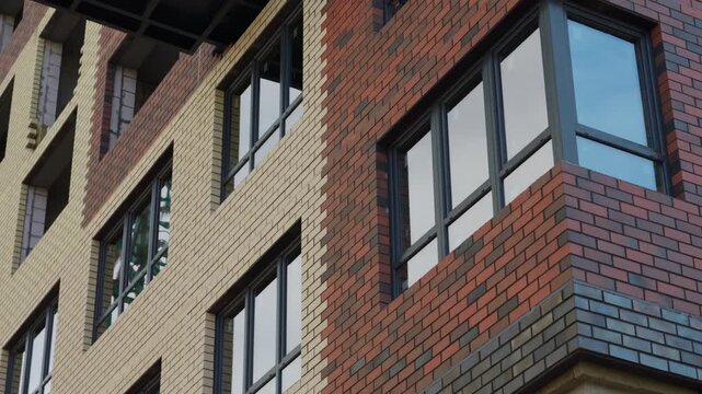 Large corner windows with glass glazing on modern residential building