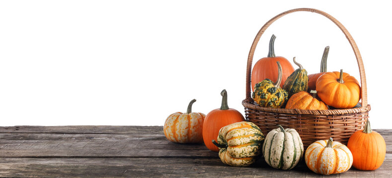 Flat lay arrangement with pumpkins on wooden background