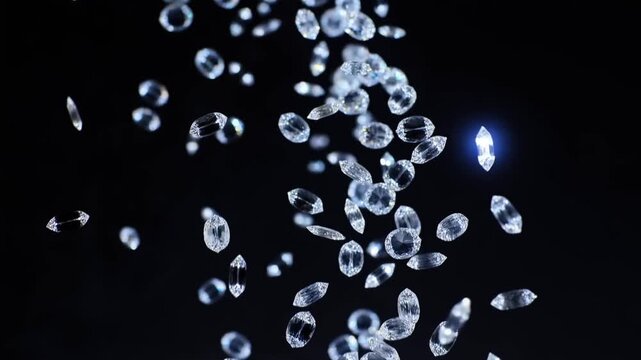 Loose cut diamonds suspended in darkness, catching light at varied angles