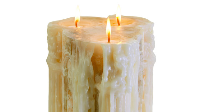 Isolated burning three-wick candle with melting wax drips creating a rustic aesthetic and warm glow