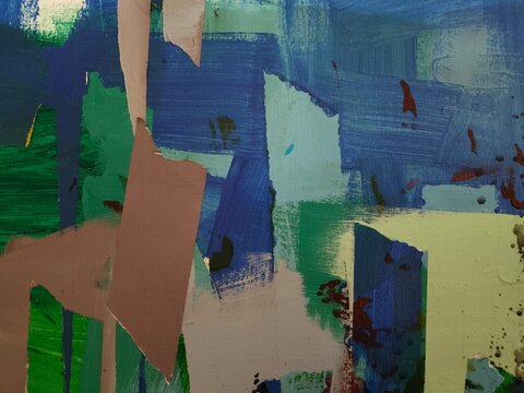 Energetic blue and green acrylic brushstrokes surround large torn mauve paper shapes and a pale yellow-green area. Red-brown splatters and fine dark specks add movement.