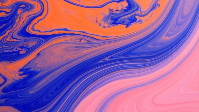 Abstract marbled colors form layered swirls in a fluid orange, blue and pink pattern