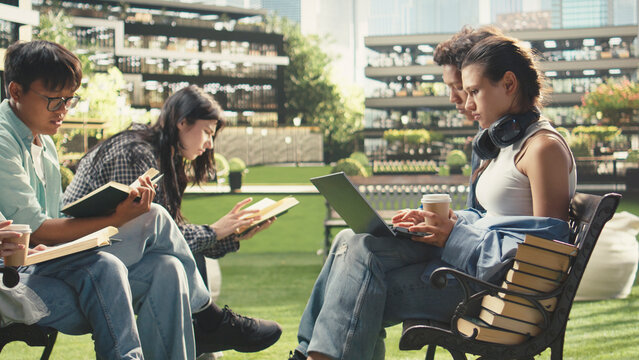 Student, laptop and coffee as young woman studies with a notebook and takeaway drink while classmates read nearby. Focus, independent learning and productivity support flexible campus study.