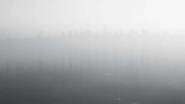Urban skyline gradually disappears beneath thickening haze over a sprawling city