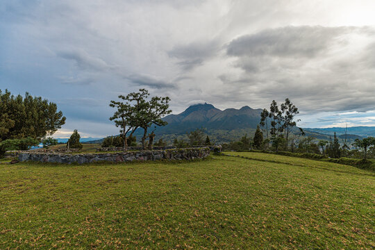 Scenic Andean mountain landscape with traditional stone circle site