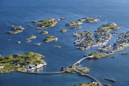 View of fishing village Henningsvaer from the top of Festv&aring;gtinden, Small islands connected by road and bridges, Austv&aring;g&oslash;ya, Lofoten, Norway