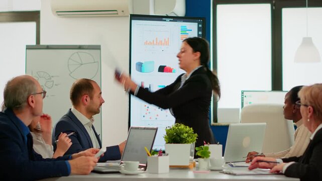 Dispute, contract and businesswoman arguing with colleagues during a boardroom meeting, reviewing documents amid workplace conflict, negotiation pressure, disagreement and strained team communication.