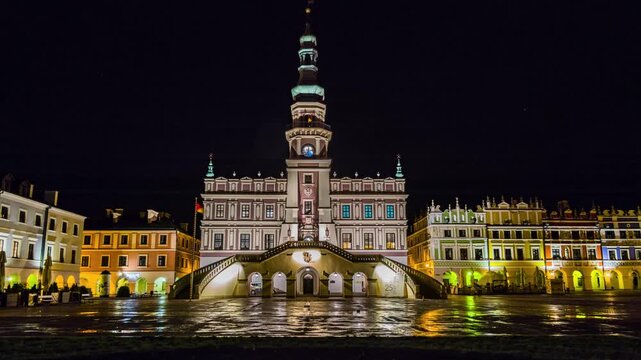 ZAMOSC, POLAND - OCTOBER 30 2017: Town Hall in Zamosc - mannerist-baroque, main building in Zamosc. It is located in northern frontage of Great Market Square. It has clock tower and fan-shaped stairs.