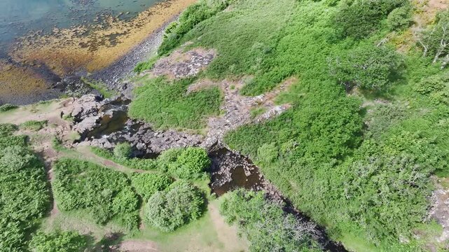 Eas Fors Waterfall from a drone, Ardow Burn, Dervaig, Isle of Mull, Scotland, England, United Kingdom