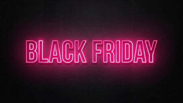 Glowing pink neon sign spelling seasonal retail sale text on dark wall