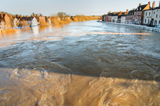 Extremely high river water levels,along the River Severn,and flood barriers,Bewdley,England,UK