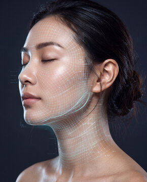 Beautiful Asian woman with closed eyes receiving digital 3D facial mesh scanning, futuristic skincare technology and biometric face recognition concept on dark background.