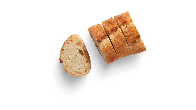 Sliced French Baguette Bread Loaf with Fresh Golden Crust Isolated on Pure White Background