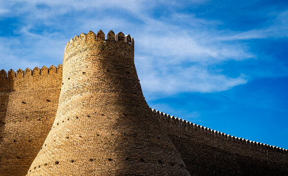 Historic Fortress Wall Against Blue Sky