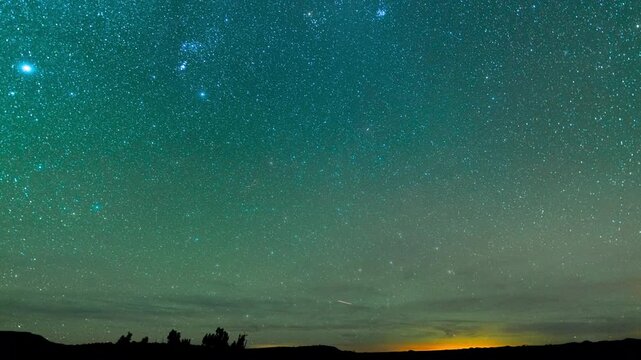 Timelapse of Constellation Orion setting over the horizon in New Mexico, USA