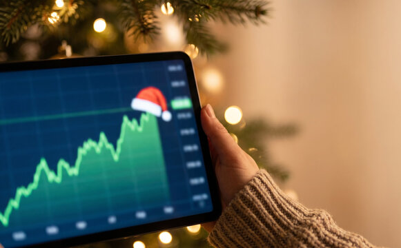 Christmas stock market rally chart on a tablet screen during holiday season