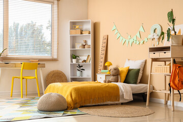Childhood development and home education, cozy bedroom interior for kids with study desk and bed in warm colors for comfortable learning environment © Pixel-Shot