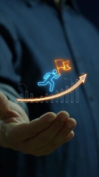 Businessman open hands presenting glowing person running with flag along rising growth arrow graph vertical shot. Career achievement sprint, business success milestone, and corporate concept idea.