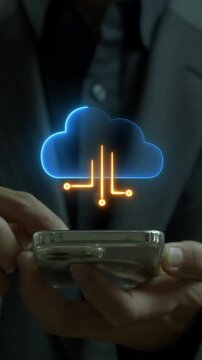 Hand holding smartphone vertical shot below a glowing cloud computing and circuit board data lines. Mobile wireless network cloud storage, digital information database, and telecom system concept.