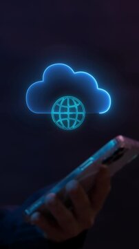 Hand holding smartphone vertical shot below glowing cloud computing icon with earth globe network. Worldwide wireless data storage, international mobile telecom, and internet server concept idea.