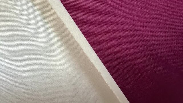 Diagonal Two Tone Burgundy and Cream Woven Synthetic Fabric 4K Video