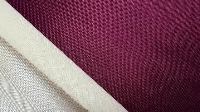Diagonal Two Tone Burgundy and Cream Woven Synthetic Fabric 4K Video
