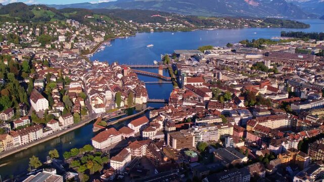 Aerial view of Lucerne old town with Chapel Bridge, Lake Lucerne and Swiss Alps, Switzerland