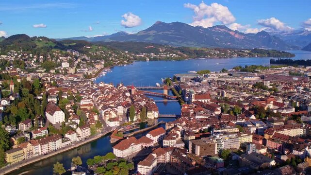 Aerial view of Lucerne old town with Chapel Bridge, Lake Lucerne and Swiss Alps, Switzerland