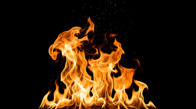 Vivid orange and yellow flames erupting upward against a deep dark background