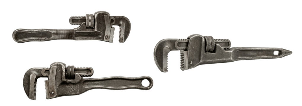 Isolated vintage adjustable pipe wrenches set for construction
