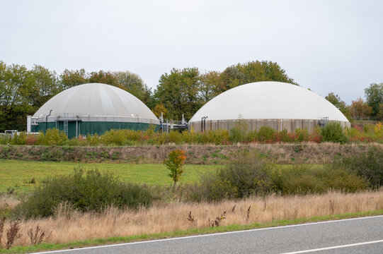 Biogas power plant, methane tank, fermenter gas holder dome, biomass energy, sustainable renewable eco friendly technology, electricity infrastructure in Germany
