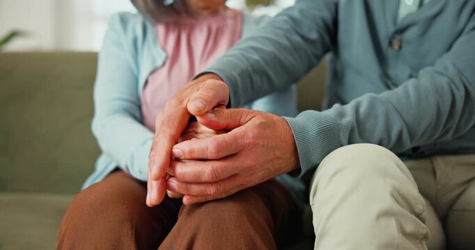 Holding hands, comfort and senior couple on sofa for bonding, support and commitment on weekend. Retirement, marriage and man with woman on couch for affection, love and empathy for relationship