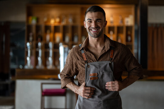 A portrait of a motivated business owner celebrating a milestone, showcasing passion for his career