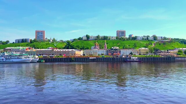 NIZHNY NOVGOROD, RUSSIA - MAY 22, 2026: View from a boat at Oka river. The Novaya Embankment, the Fedorovsky Embankment, and the Stroganov Church, or Church of the Nativity of the Blessed Virgin Mary