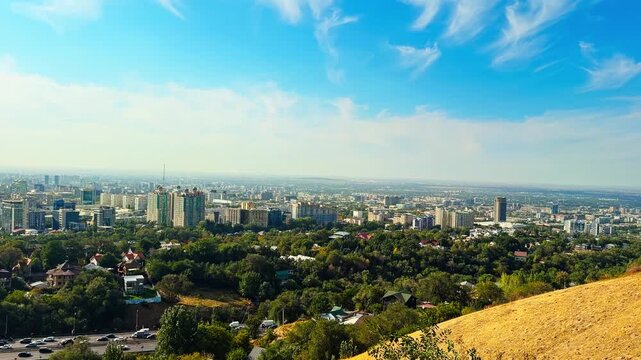 High-rise Cityscape With Floral And Lavender Terraced Slope At Kok Tobe Park In Almaty, Kazakhstan. Panning Shot