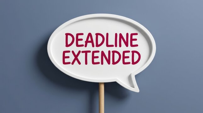 White speech bubble sign with red deadline extended text, indicating an important update or postponement.