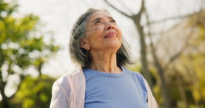Thinking, park and fitness with senior woman, fresh air and daydreaming for morning exercise. Smile, old person and vision in nature with breeze, positive mindset and training for healthy lifestyle