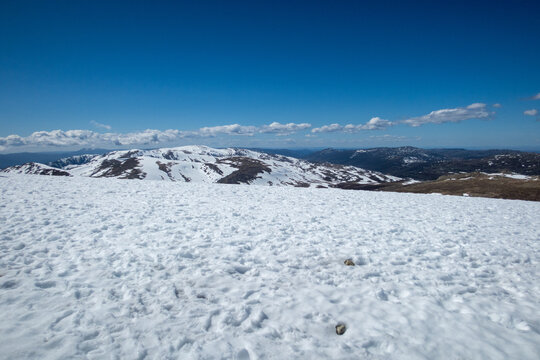 Snowy Mountain Range Under Clear Blue Sky