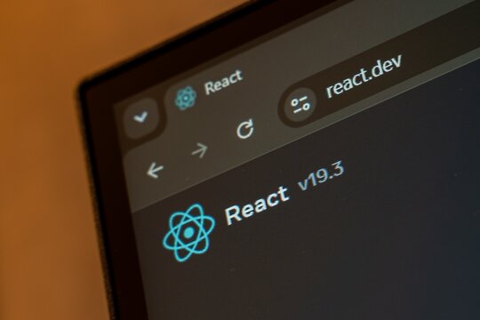 06 OCTOBER, 2026 - Tashkent, Uzbekistan: A close-up of a browser tab displaying the React website, showcasing its logo and version number.