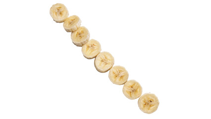 Diagonal line of fresh sliced banana fruit rounds isolated on white background © James